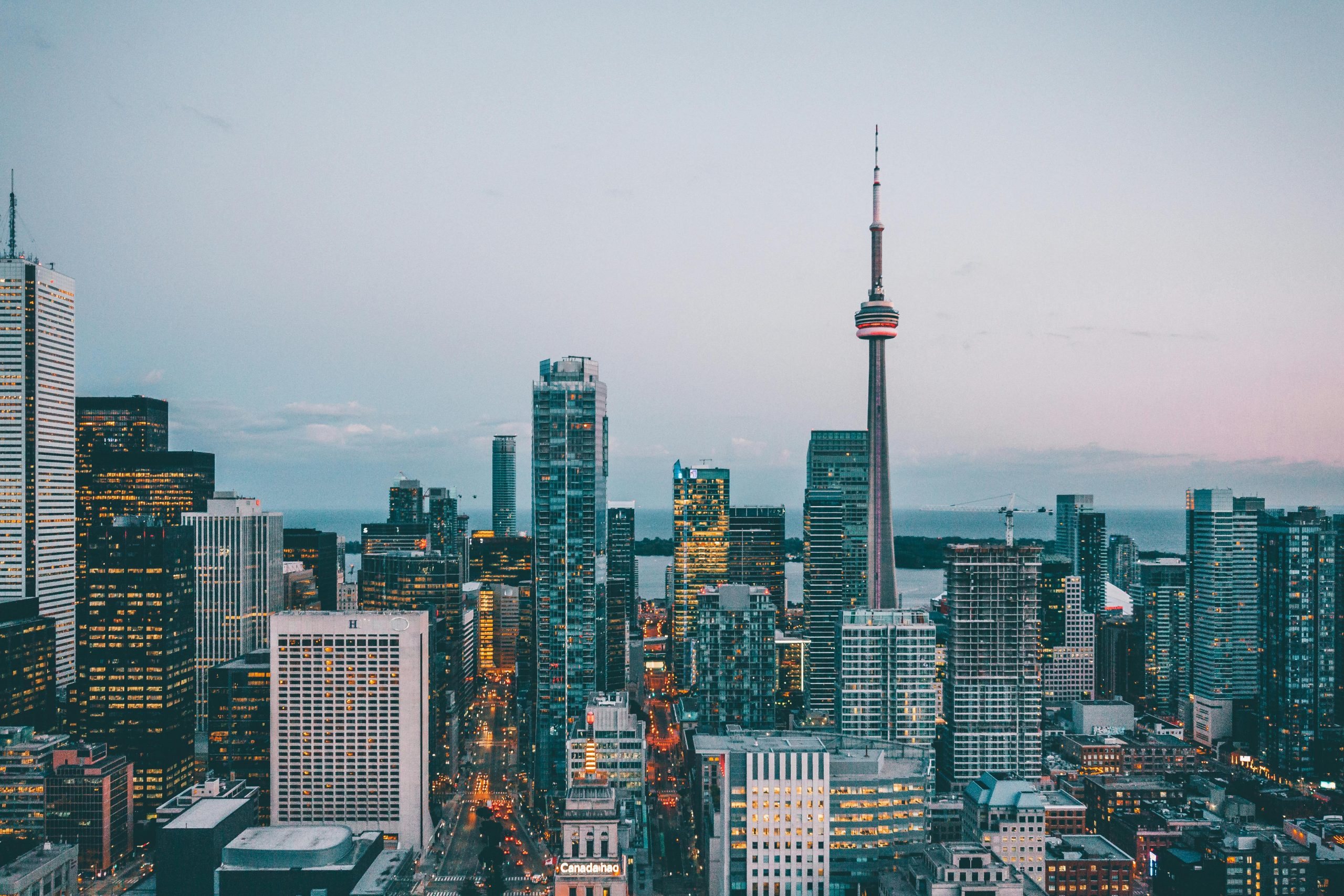 Toronto skyline glass buildings at dusk